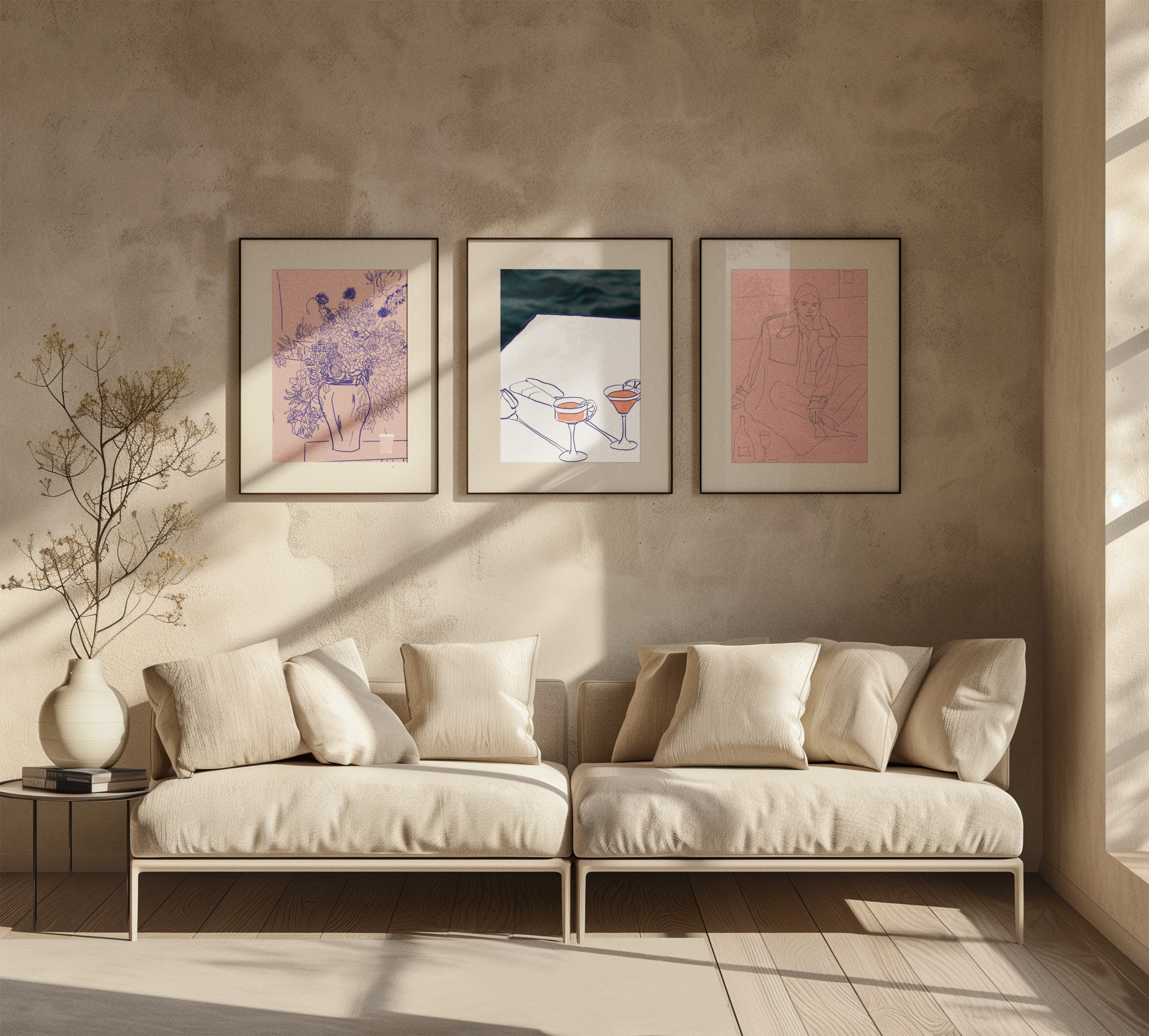 Beige sofa and framed art prints in a sun-lit Mallorca living room by House of Summer